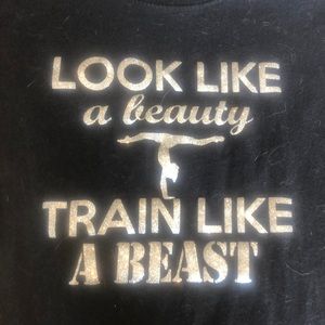A small fitted black gymnastics t shirt